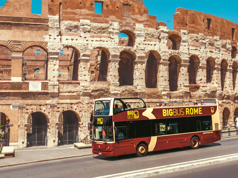 1-big-bus-tour-bus-passing-the-colosseum